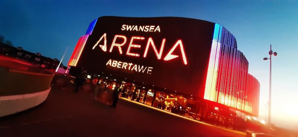 Swansea arena illuminated at night
